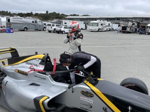 Preparing F1 Driver in Grey Car