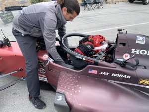 Preparing F1 Driver in Red Car