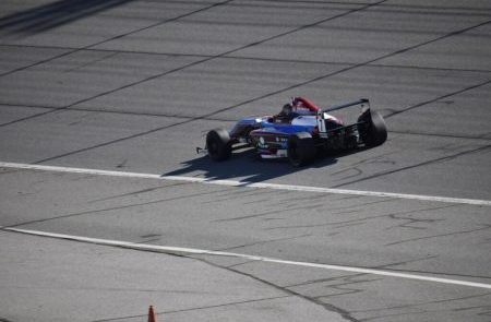 Blue F1 Car on Race Track